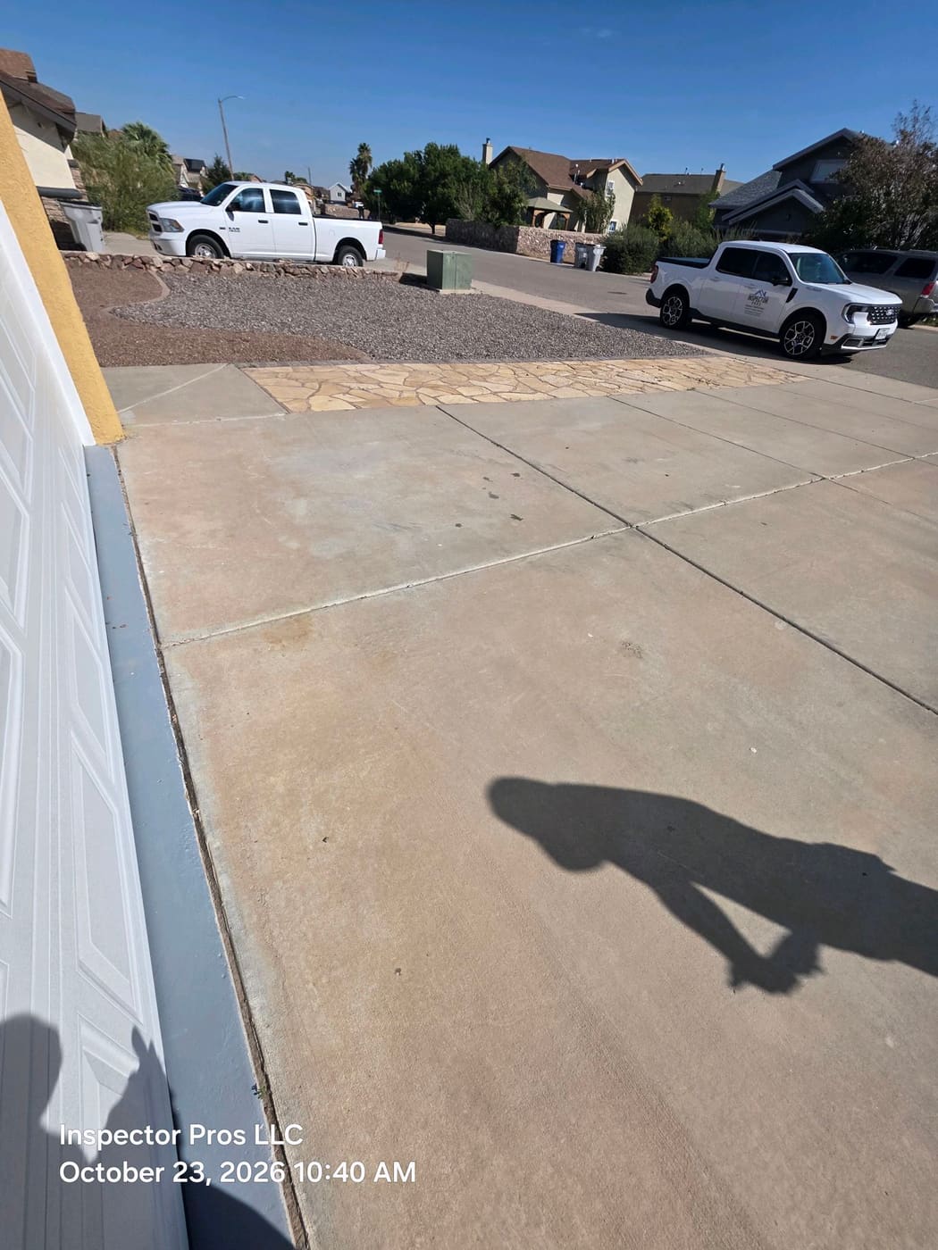 Driveway running from the garage to the street on a flat Upper Valley lot