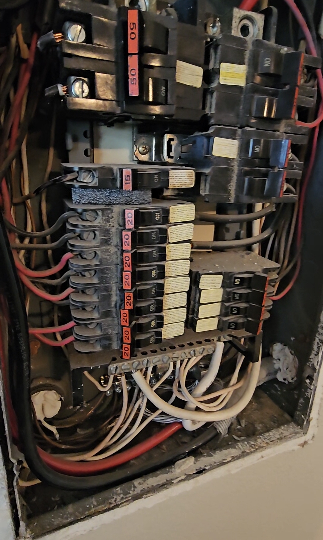 Federal Pacific Stab-Lok electrical panel with distinctive red breakers found in an older El Paso home