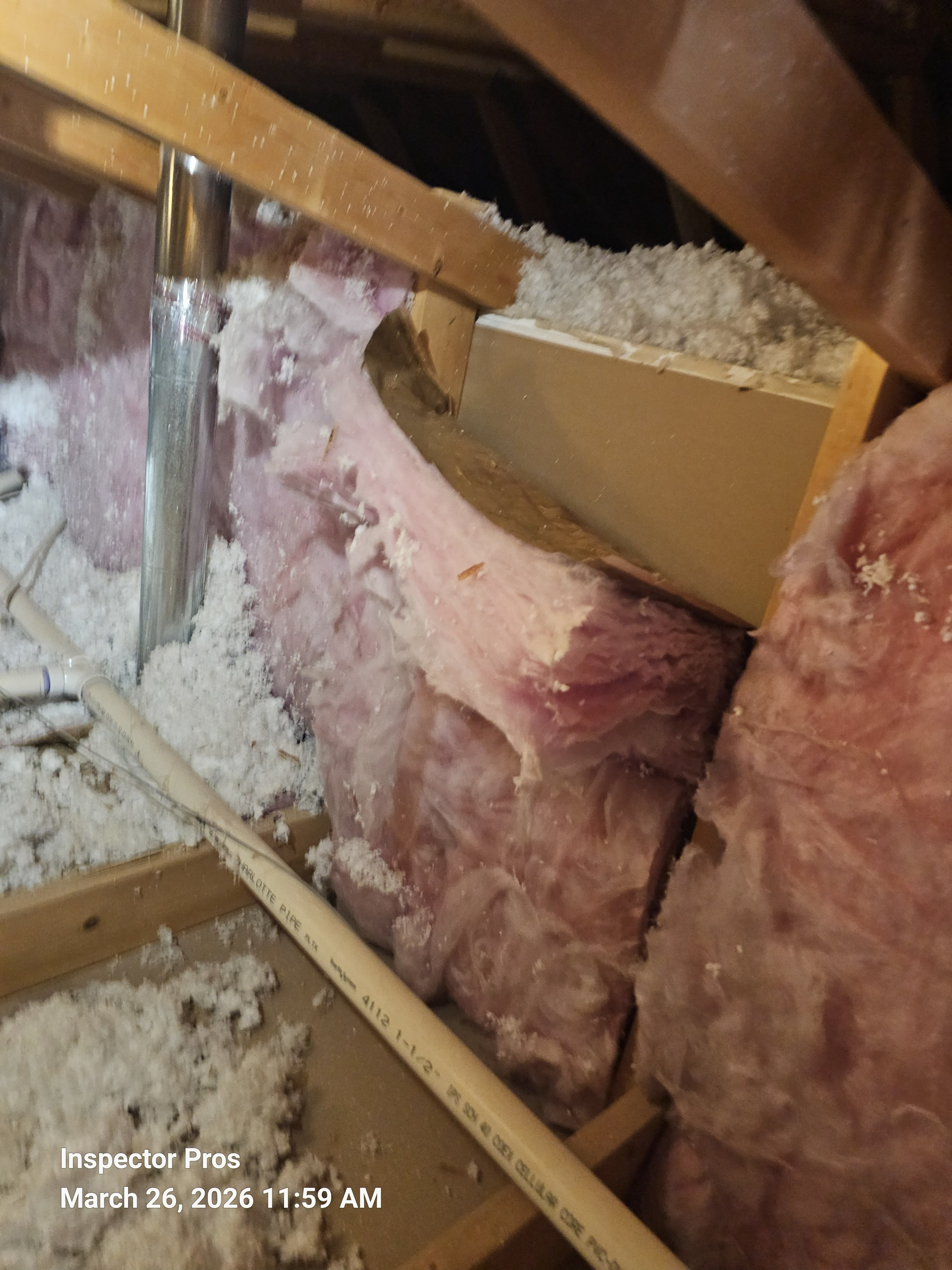 Missing insulation at an attic knee wall in a new construction home in the El Paso area